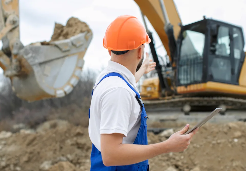 a demolition contractor work in a plot